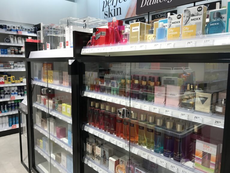 Expositor de cristal para perfumes, lociones, fragancias y otros productos, equipado con un cierre inteligente.