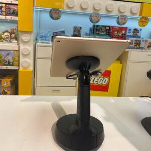 Tablet on Black Security Device in Lego Store